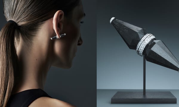 Left: a woman with a brunette ponytail faces away from the screen and wears a black earring pointed in front and behind her ear with diamonds circling its center. Right: a close up of a black piece of jewelry pointed on both ends, with diamonds at center.