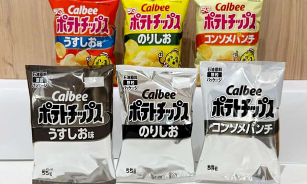 Calbee temporarily replaces the colorful packaging of 14 best-selling products with simple black-and-white packs. Courtesy of Calbee.