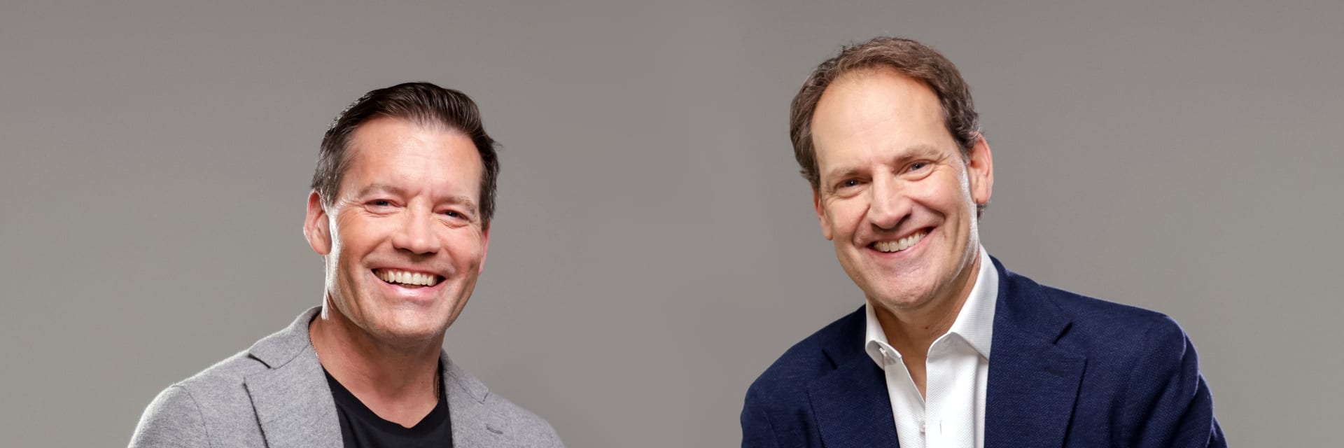 Image of Eric Campbell and Jon Cook smiling.