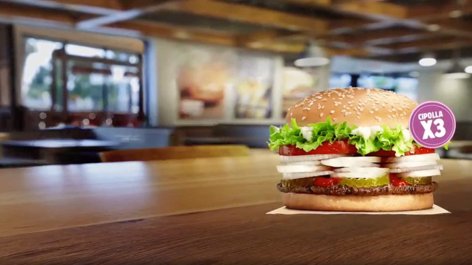 Burger King Whopper on wooden table