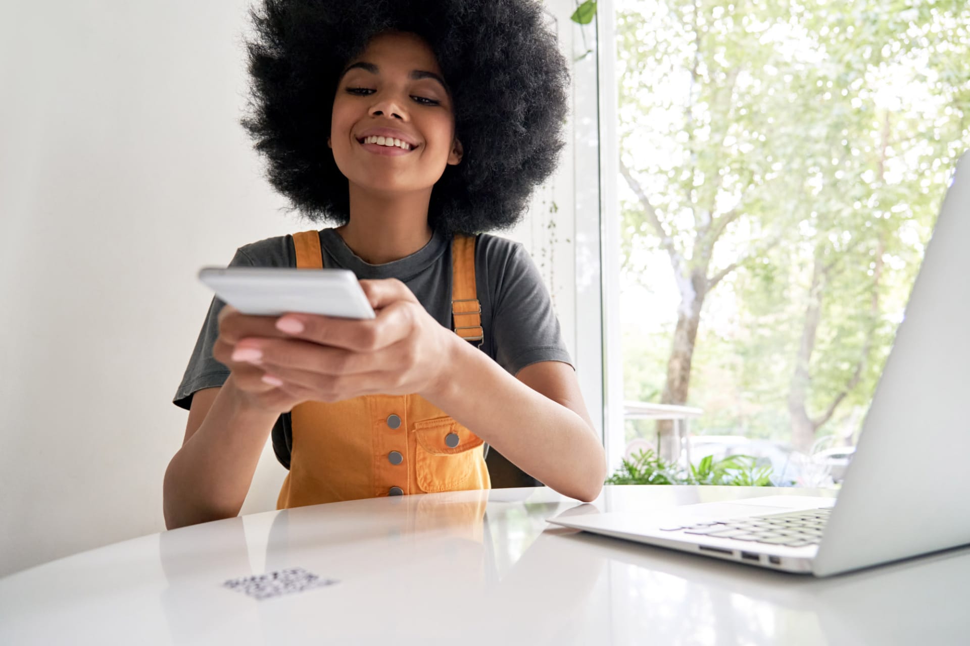 Woman scanning QR code
