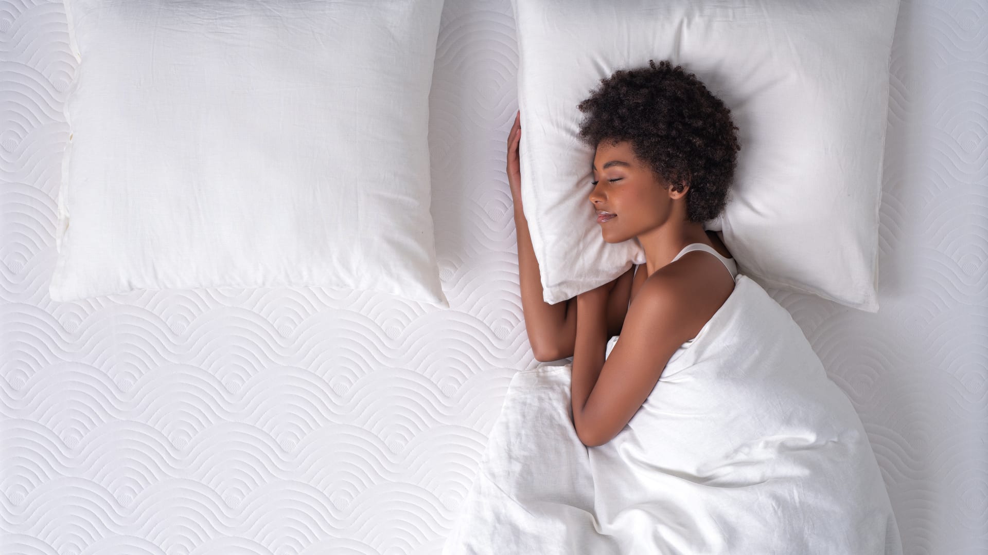 Woman sleeping on Tempur mattress