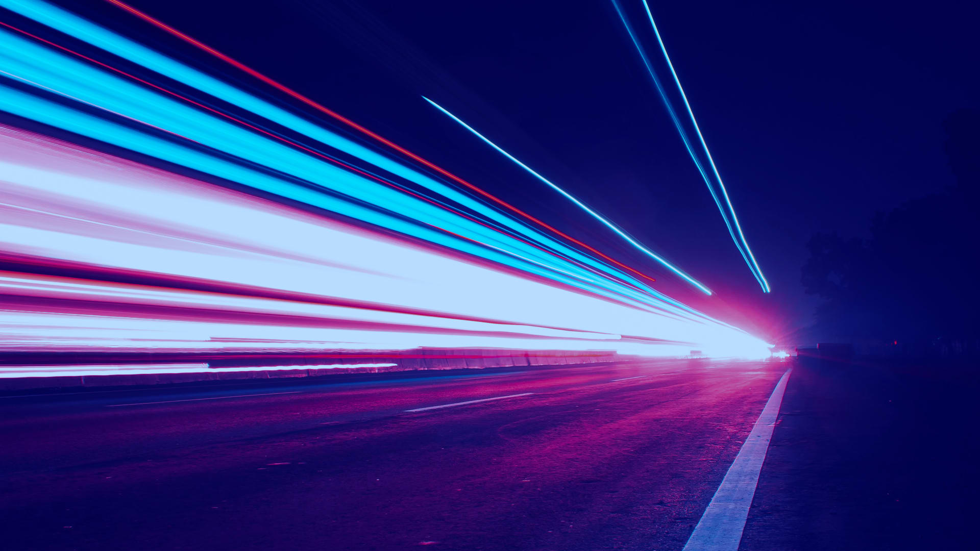 Red and blue lights on a road