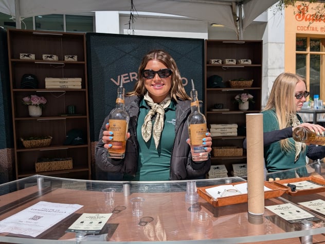 Woman at bar serving drinks