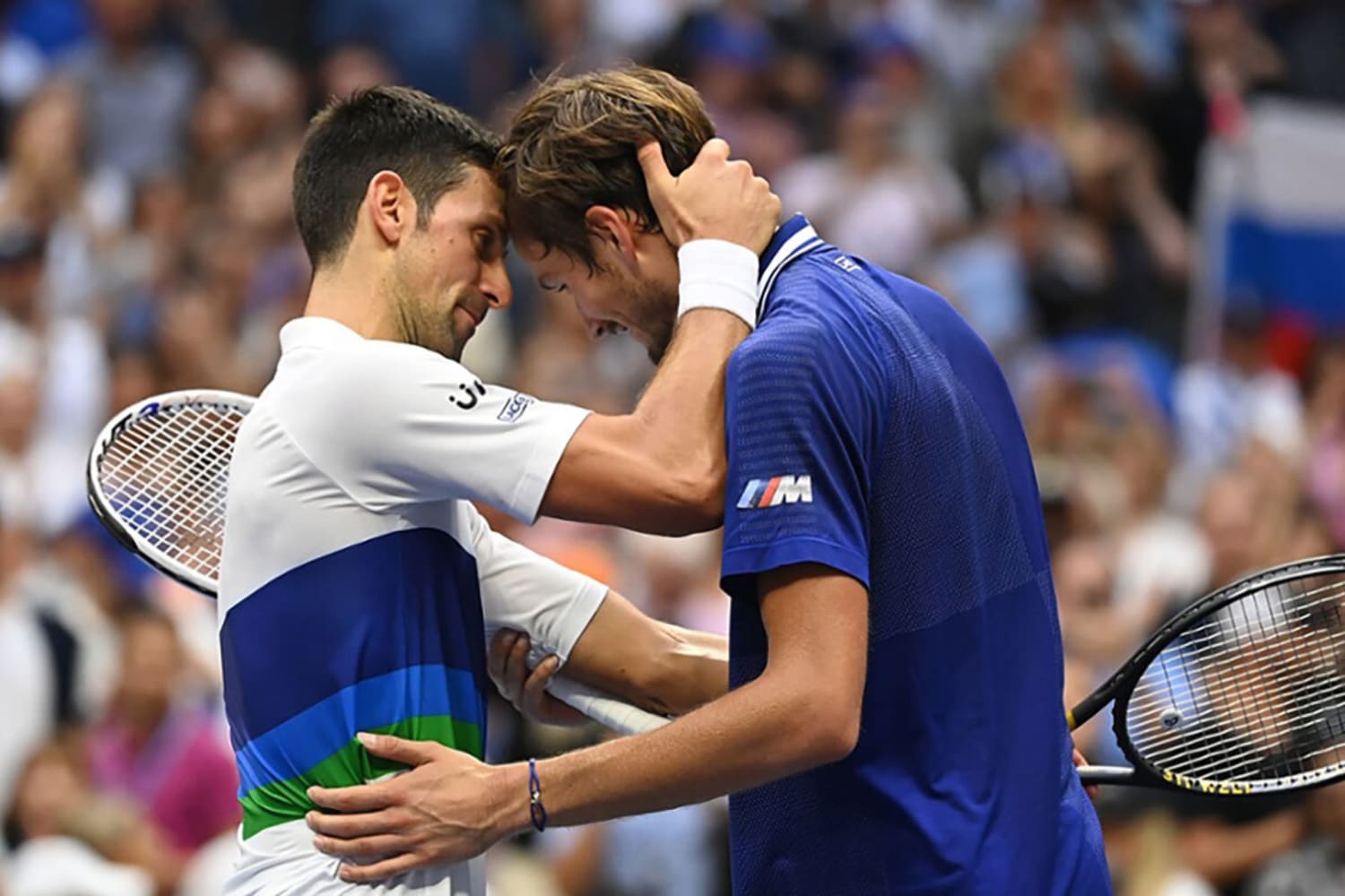 WEB Novak Djokovic hugs Daniil Medvedev after the Mens Singles championship match at the 2021 US Open Sunday Sep 12 2021 in Flushing NY Garrett Ellwood USTA