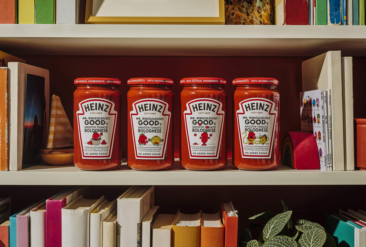Bookshelf with the 4 jars of sauce.