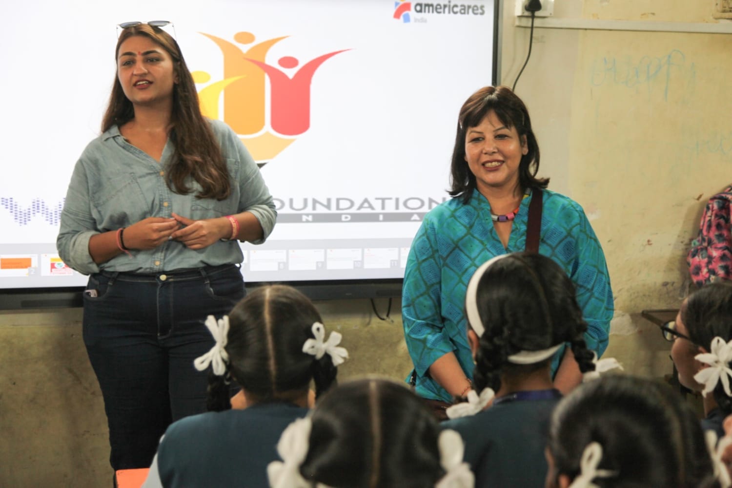 Babita Baruah, the CEO of VML India interacting with schoolgirls at a VML Foundation Day event