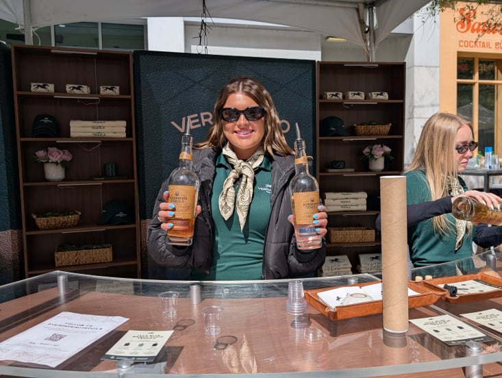 Woman at bar serving drinks