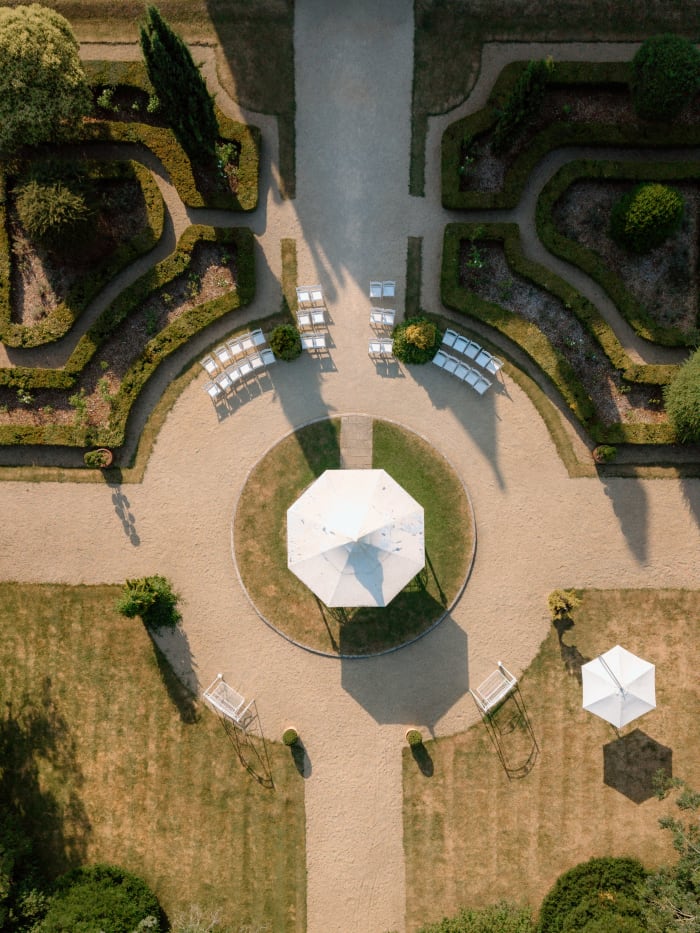 Looking straight down on the formal gardens set out for the ceremony, The Cotswolds