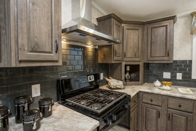 The Newton 702B range hood and cabinets