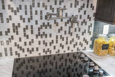 Ridgecrest Ultimate Kitchen Two stove top, mosaic inlay backsplash, pot filler
