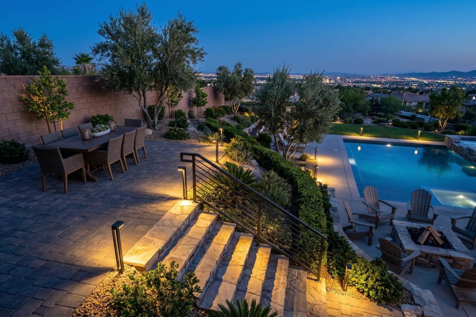 True Lumens Pro-Line Bollard lights illuminating a multi-level backyard with warm 3000K landscape lighting