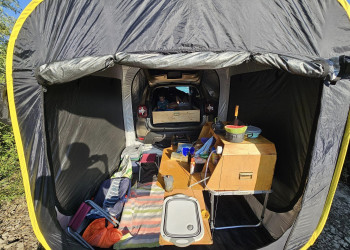Tailgate tent camping supplies setup.jpg