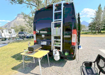 Ram ProMaster 3500 campervan ladder propane campground.jpg