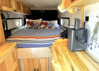 Ram ProMaster 3500 camper custom interior fixed bed.jpg