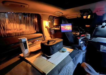 Hyundai Genesis GV70 SUV camping electric lunch box window panels seat tray.jpg