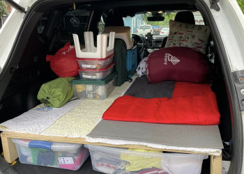 Bed platform inside Toyota RAV4 SUV camper temporary build.jpg