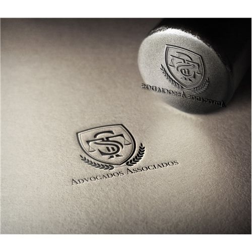 Embossed law firm stamp design for Advogados Associados with shield monogram and premium legal branding