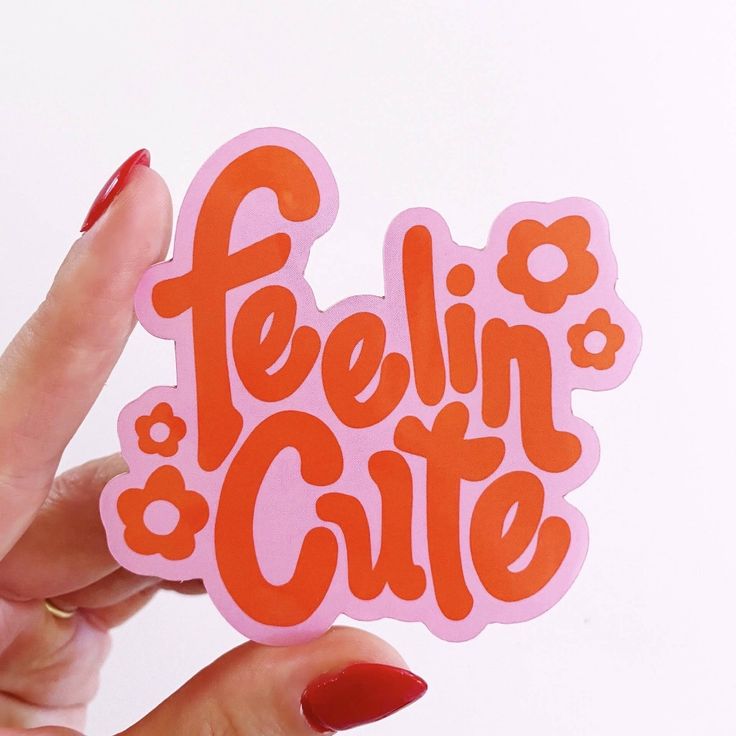 Cute typography sticker reading feelin cute in pastel colors