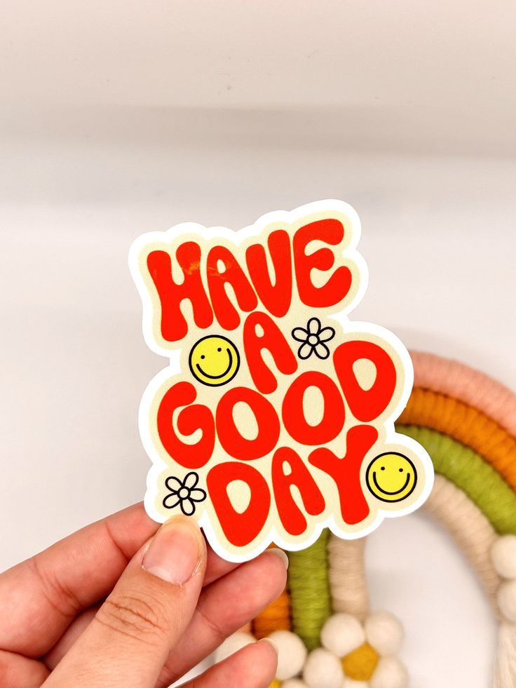 Have a Good Day retro typography sticker with smiley faces and floral icons