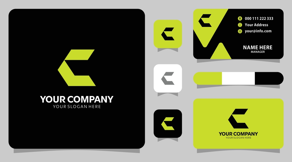 Professional lime green and black geometric monogram logo for a tech company with business card mockups