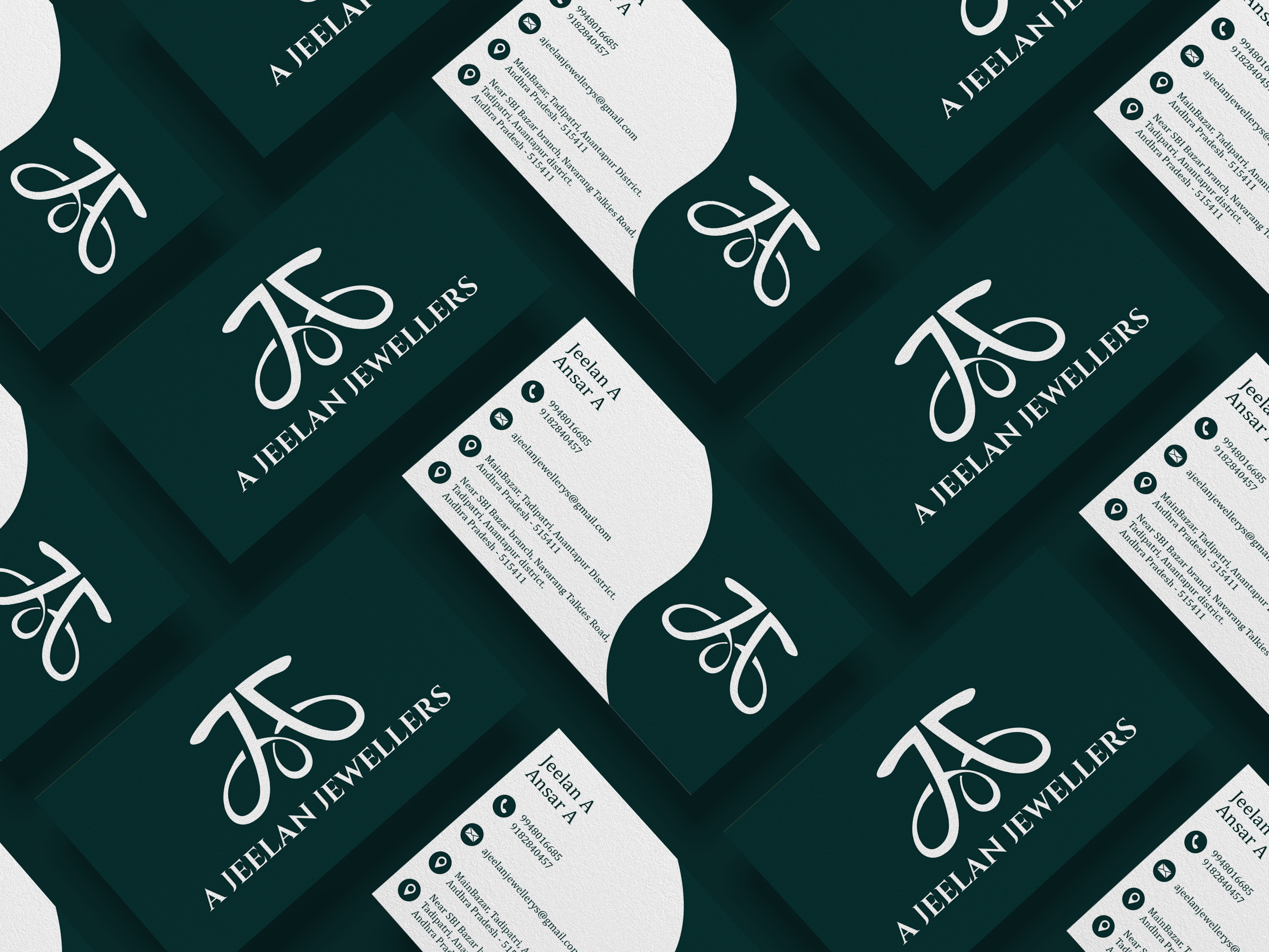Mockup of dark green luxury business cards for Jeelan Jewellers with a white script logo