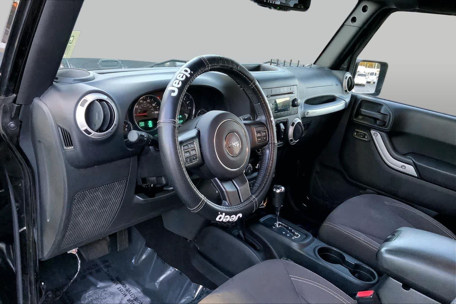 Pre-Owned 2016 Jeep Wrangler Unlimited Sahara — photo 1 of 27