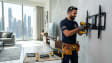 Professional handyman services in Dubai – Karigar UAE handyman doing home repairs in apartment