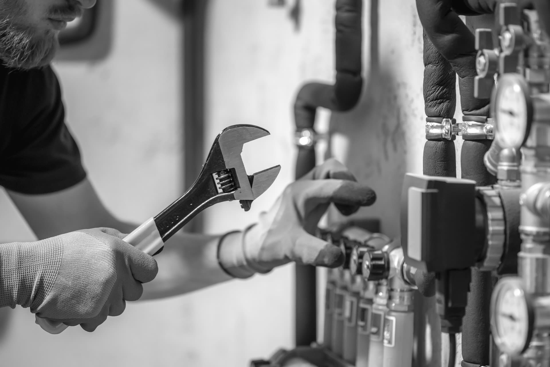 Professional technician installing heating system