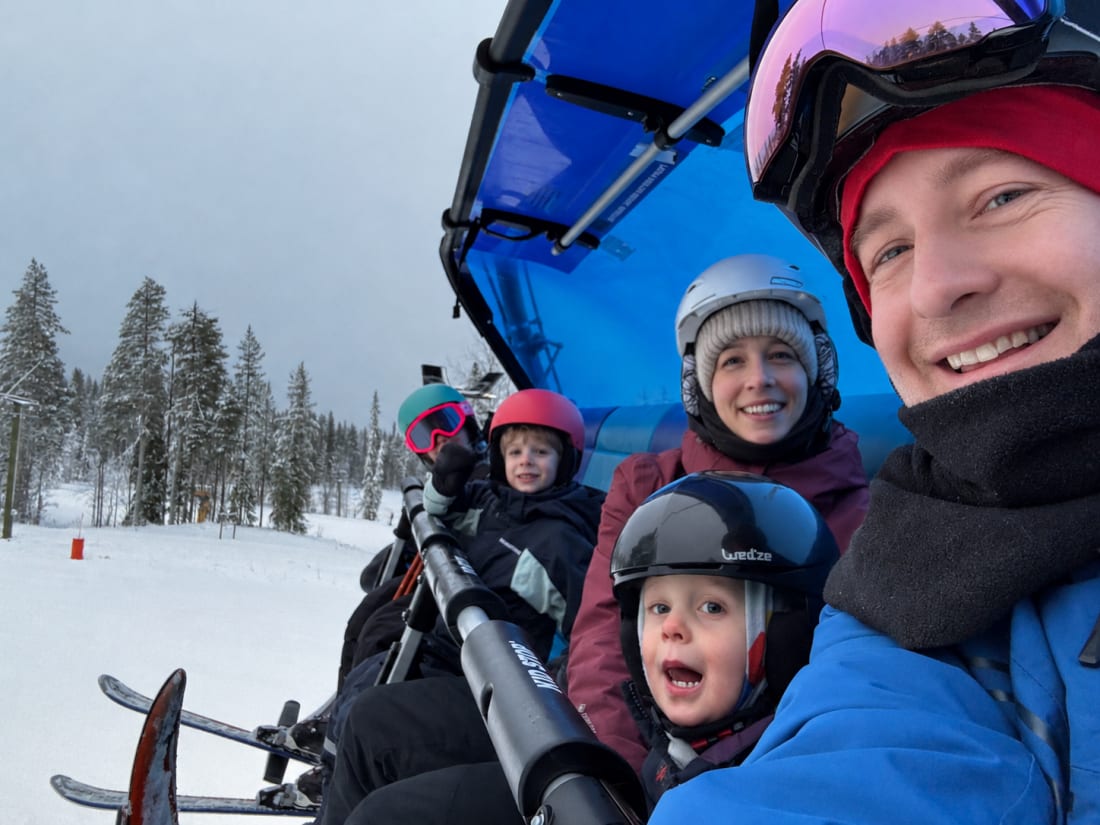 Colin, Livi and their three boys on the Levi ski lift