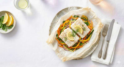 Photo de la recette Papillotes de cabillaud aux petits légumes, idée de déjeuner à 210 kcal par portion