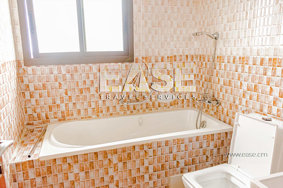 Appartement meublé salon rouge - Douala Ndogbong 13