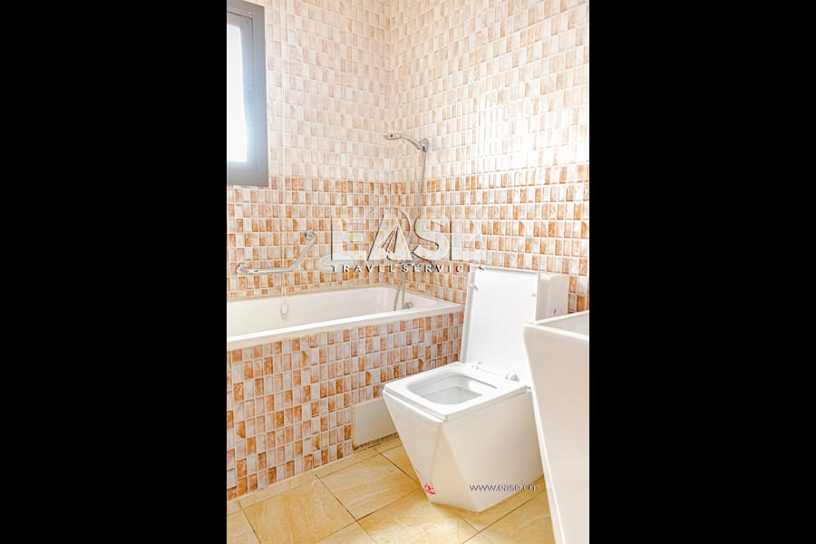 Très Bel Appartement meublé salon orange - Douala Ndogbong 11