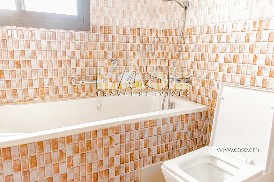 Appartement meublé salon rouge - Douala Ndogbong 7