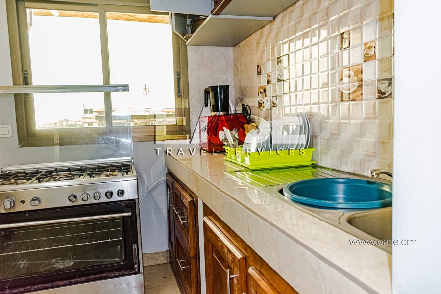 Appartement meublé salon rouge - Douala Ndogbong 15