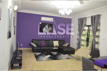 Very nice furnished apartment purple living room - Douala Ndogbong 3