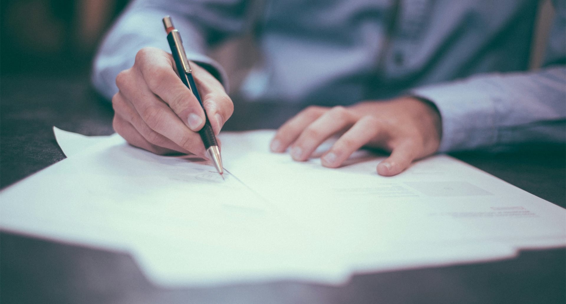 Legal documents and pen representing Claim Forms for small debt claims
