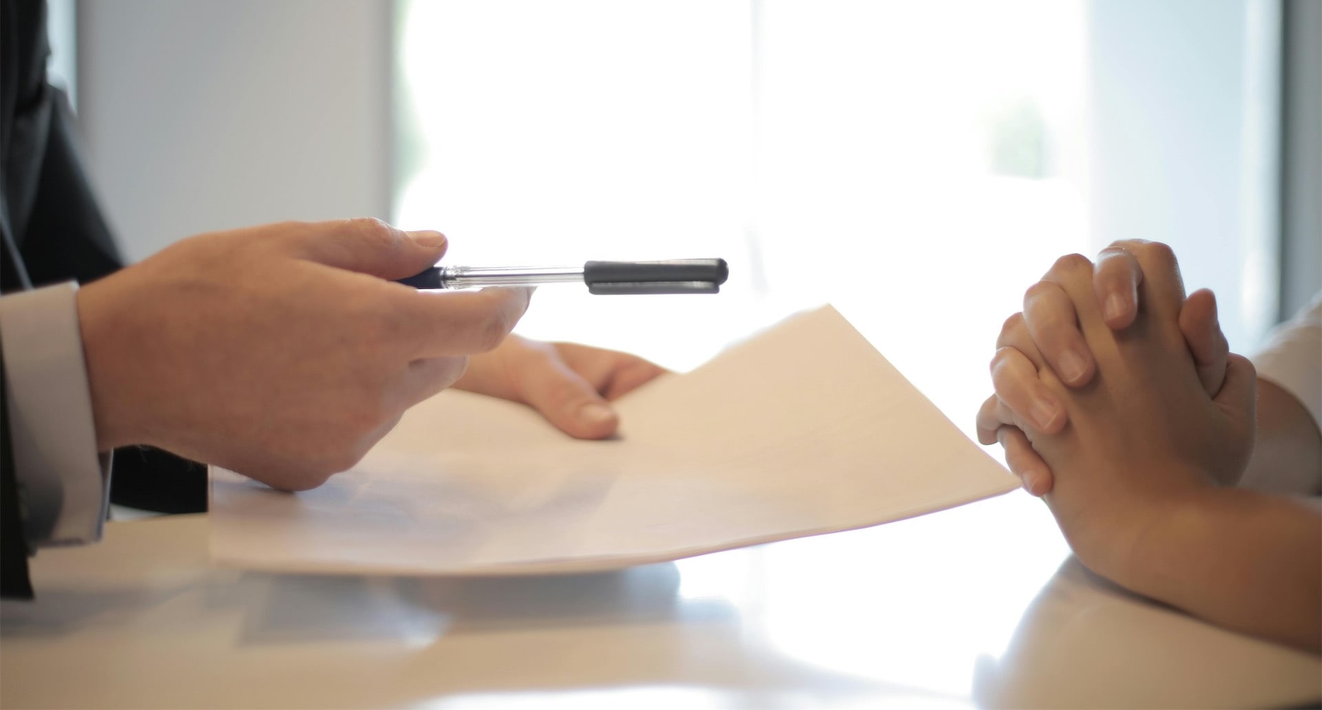 Legal documents and calculator representing costs in small claims cases