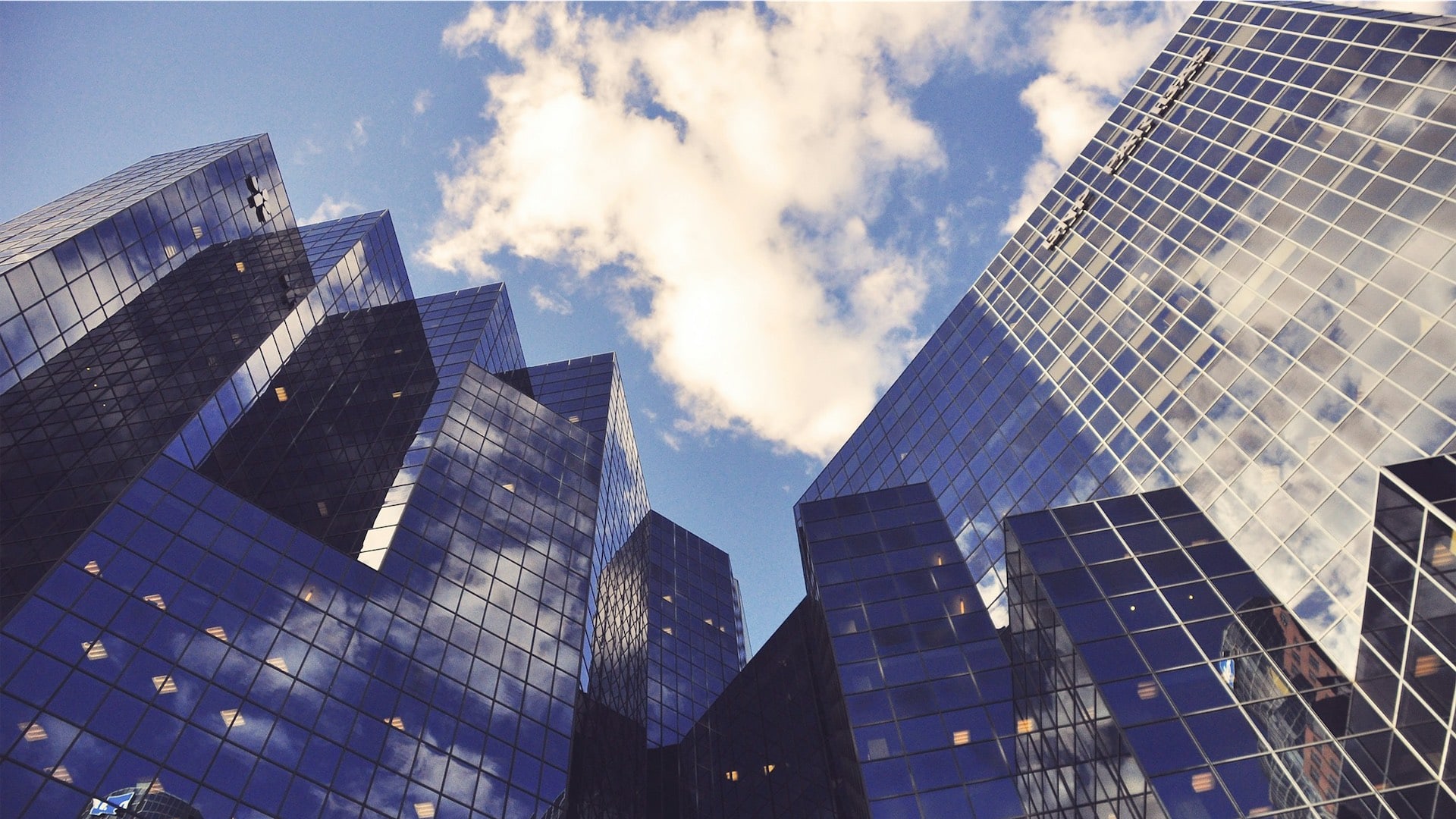 Low angle photo of curtain wall building