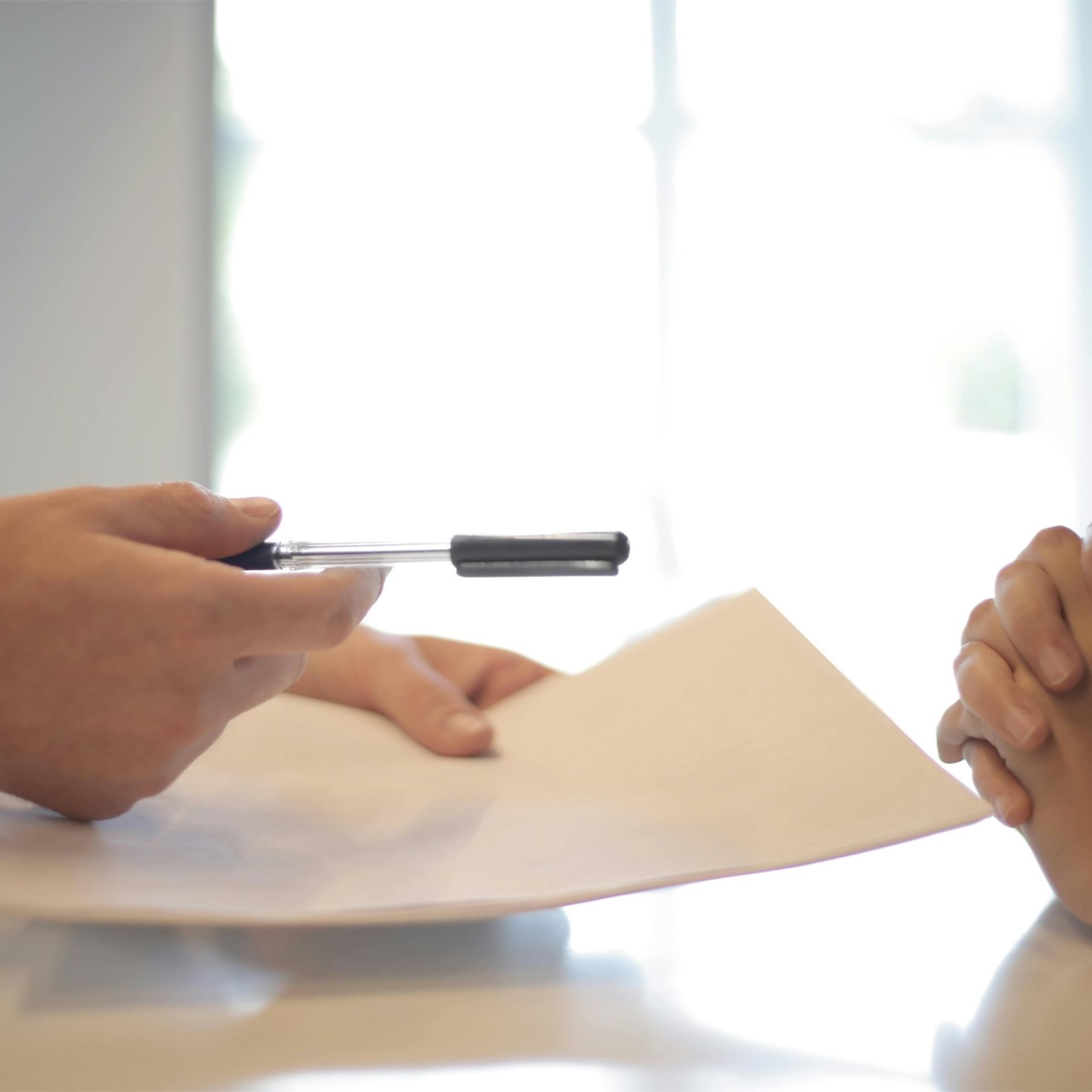 Legal documents and calculator representing costs in small claims cases