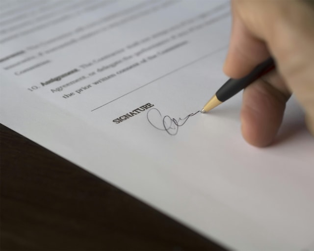 Legal document and pen representing a Letter Before Action in debt claims