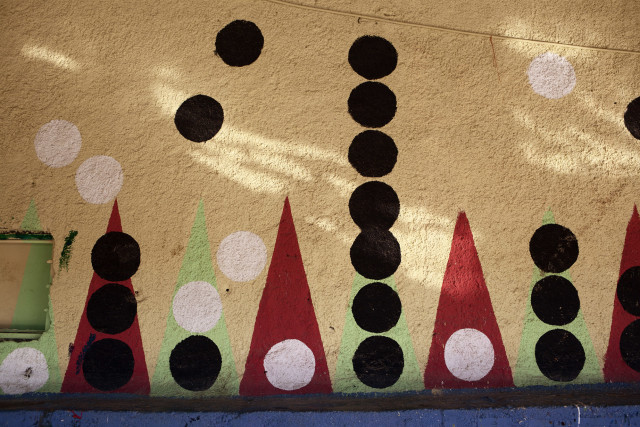 Claire Eggers Sunlight dappling a mural created as part of The Backgammon Project