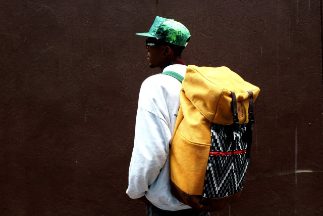 Brian Mokhachane | SoulArt Foundation The SoulArt Foundation Masihambisane Travel Bag is handmade from recycled materials