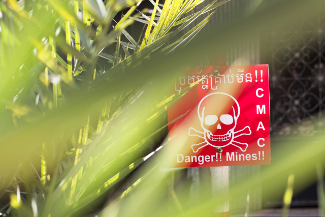 Travis Hodges Mines kill or maim around 5,000 annually