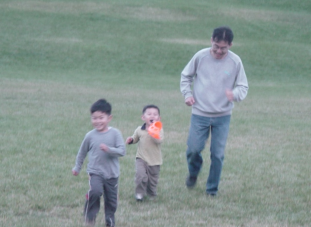 Dad, bro, and me running