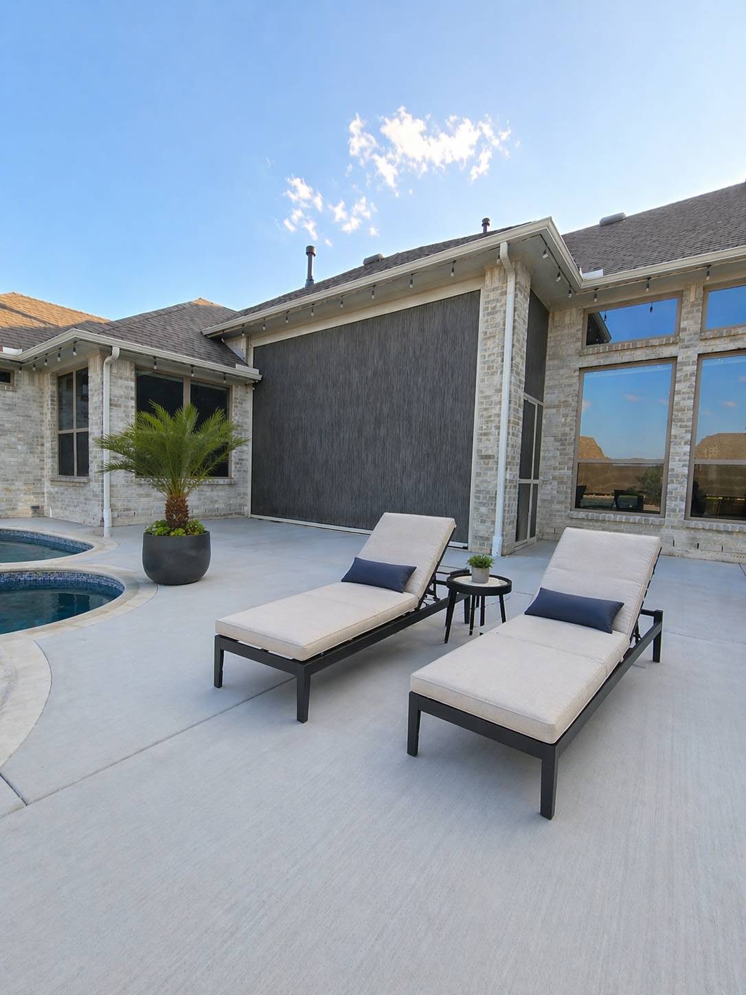 Patio with the V-Track solar shade screen deployed in Lake Charles, Louisiana