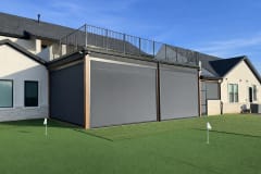 Professional installer completing V-Track screen installation