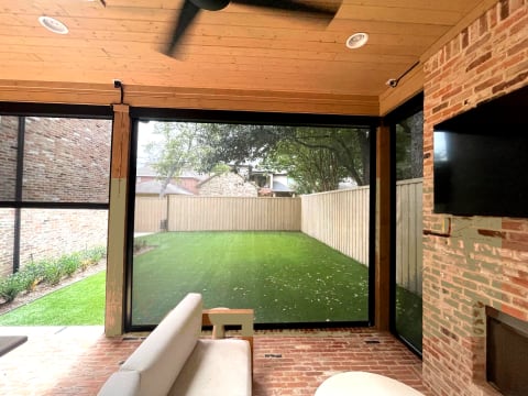 V-Track motorized backyard screen installation