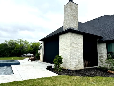 V-Track motorized screen at corner pool home