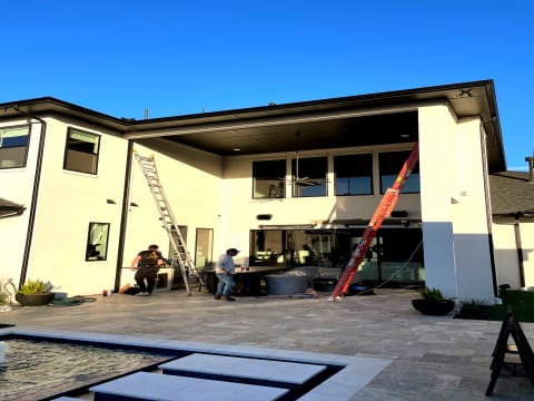 V-Track exterior motorized screen installation